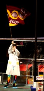 Announcer Yoji waving DNA's flag.